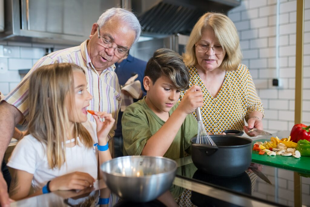 Children cooking with their Grandparents.